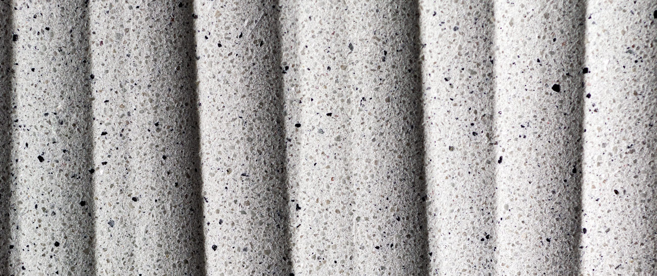 Within the TAKTL KORSA program, natural aggregate finishes can be added to standard TAKTL panels and customized for color, size, and density. KORSA is compatible only with Mediablast finish as the blasting process exposes the aggregate applied during casting.